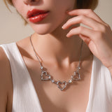 COLLAR DE ACERO QUIRURGICO CON DIJES CORAZON 035