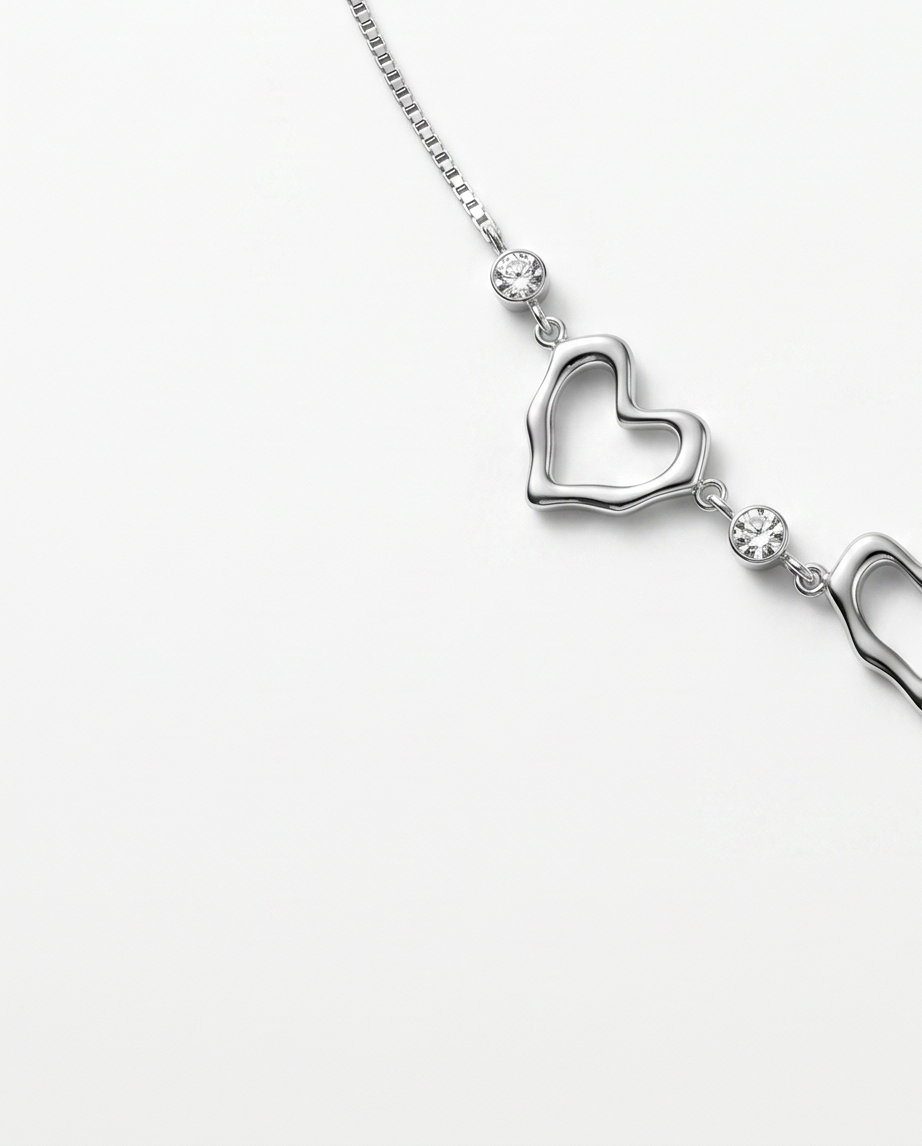 COLLAR DE ACERO QUIRURGICO CON DIJES CORAZON 035