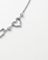 COLLAR DE ACERO QUIRURGICO CON DIJES CORAZON 035