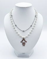 COLLAR DON DIJE ACERO NENITOS Y PERLAS 2025-2026