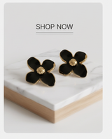 CARAVANAS DE ACERO CON FLOR ESMALTADA