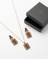 Conjunto de caravanas y collar en bronce