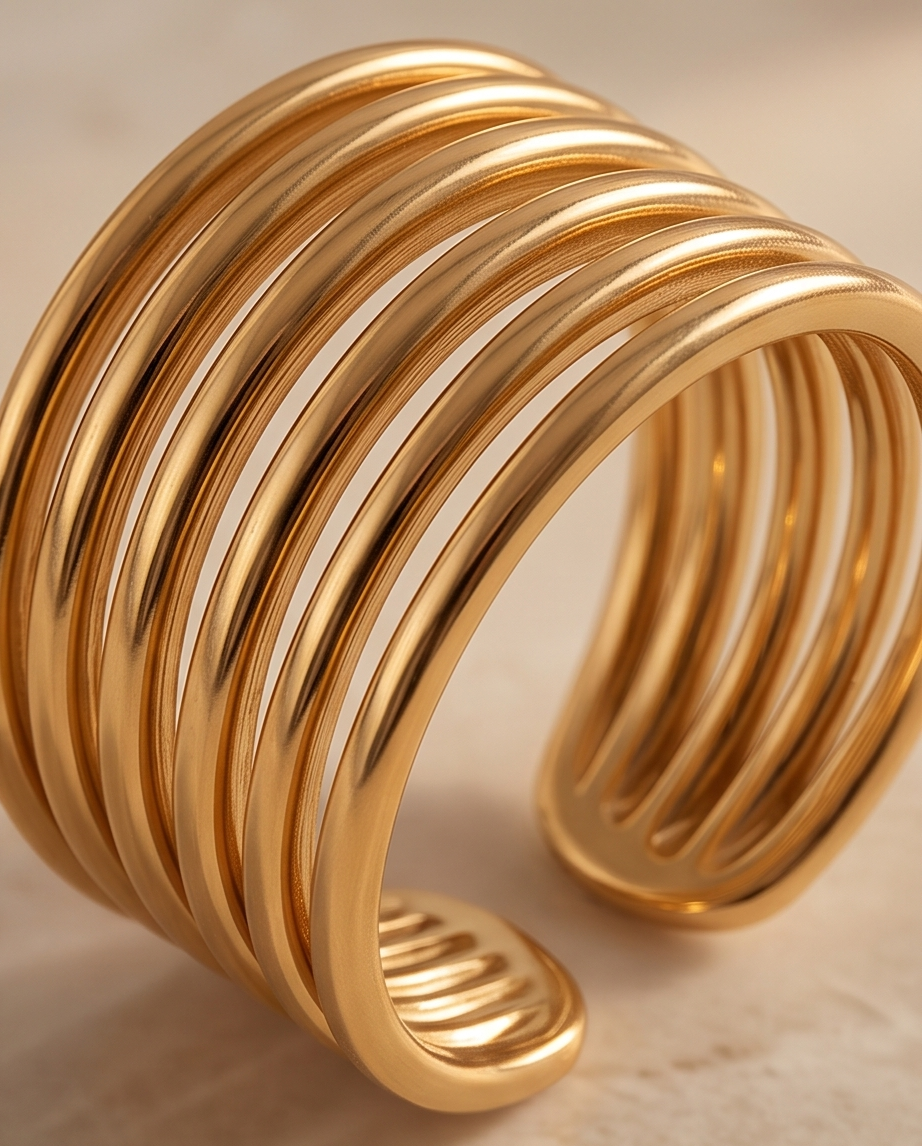 ANILLO DE ACERO QUIRURGICO DORADO COLECCIÓN 2027