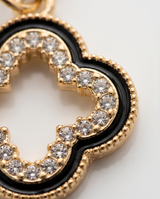 Pulsera fantasia con dije combinado dorado