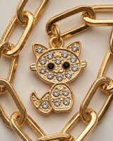 Pulsera de fantasia dorada con dijes linea vip