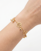 Pulsera fantasia con dijes color rosa